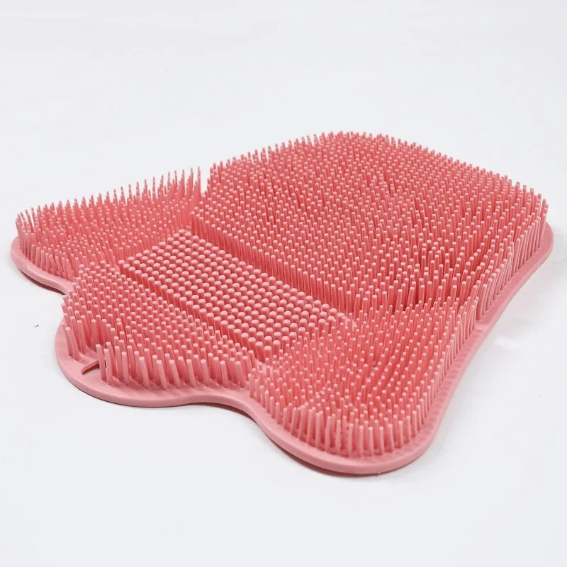 Blue silicone bath scrub mat for back washing, measuring 31cm by 32cm, mounted on a shower wall.