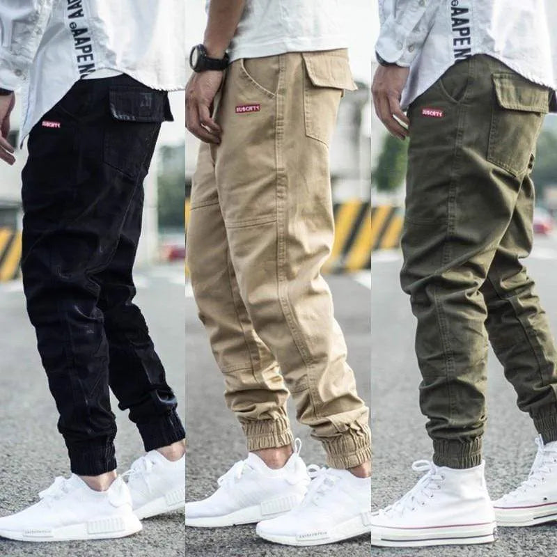 Men's casual tight-fit pencil trousers in khaki with zipper front and mid-rise waist
