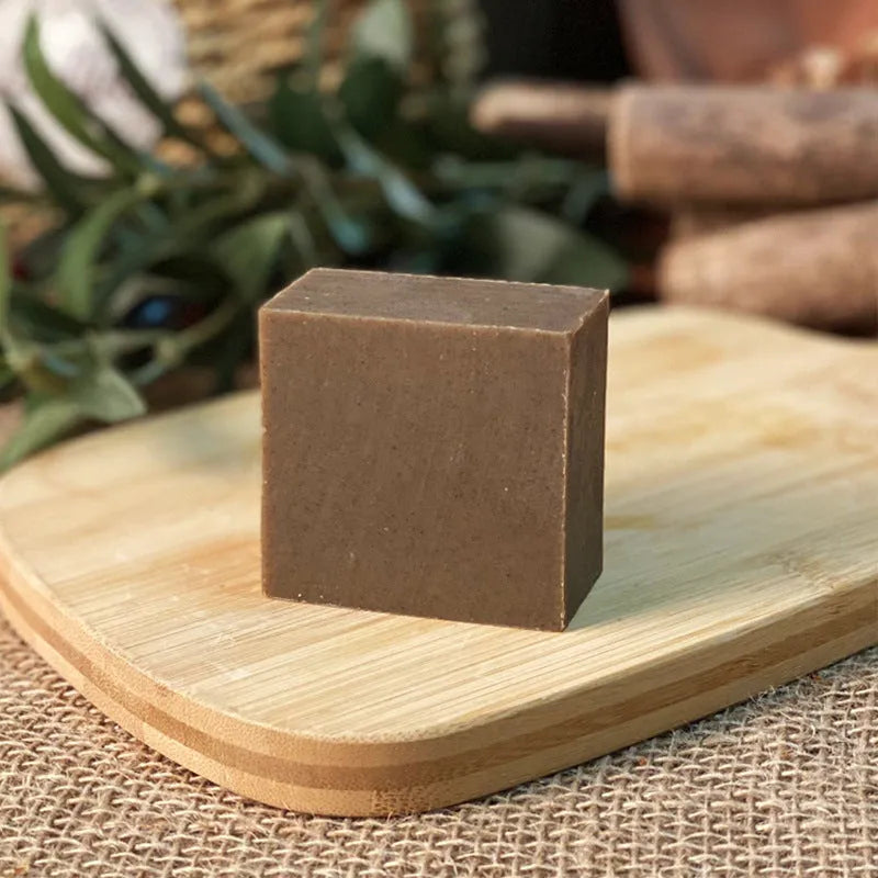 A single 72g bar of handmade nine grass cold process shampoo soap, silicone oil-free.