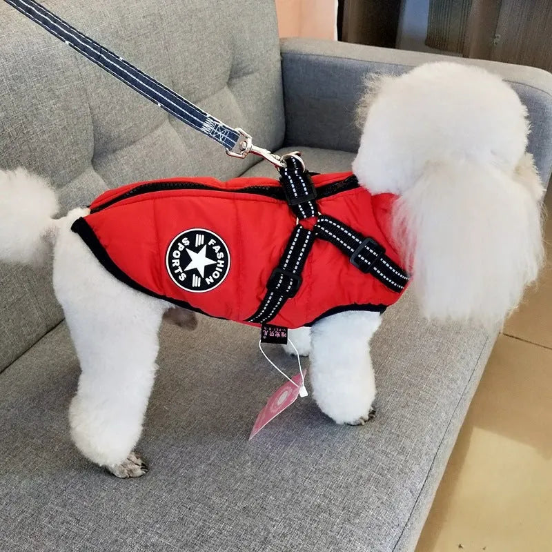 Waterproof dog coat with integrated harness in red, navy blue, and army green colours for winter.