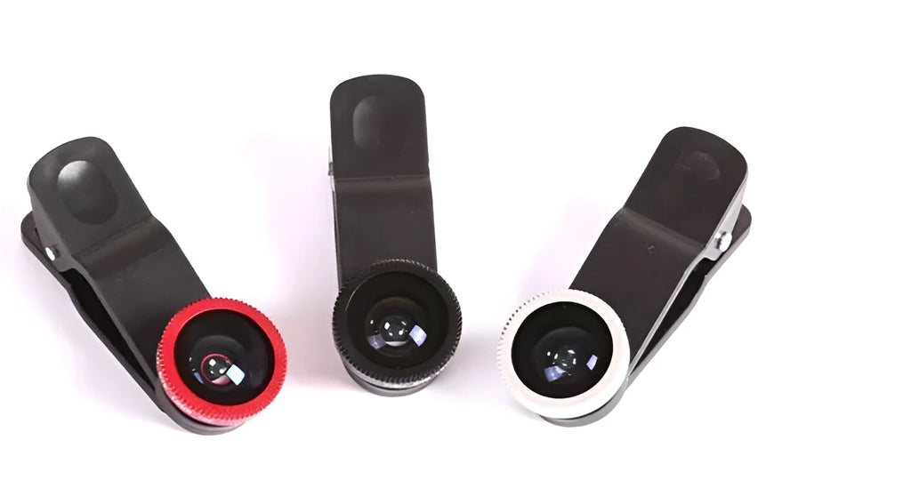 Smartphone with a silver clip-on lens attachment showing wide-angle, macro, and fisheye lenses.