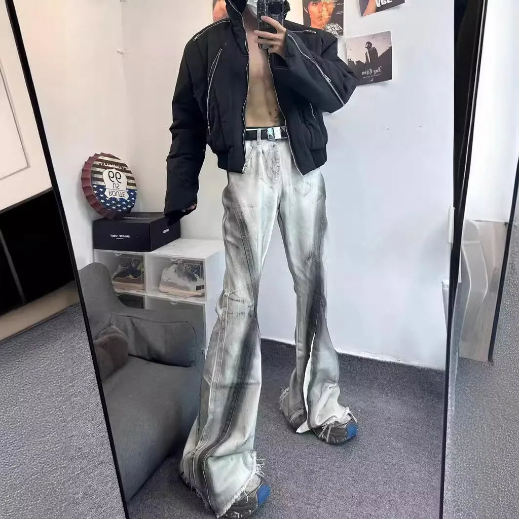 White heavy rough selvedge denim jeans with black ribbon gradient detailing, mid waist, zip fly.