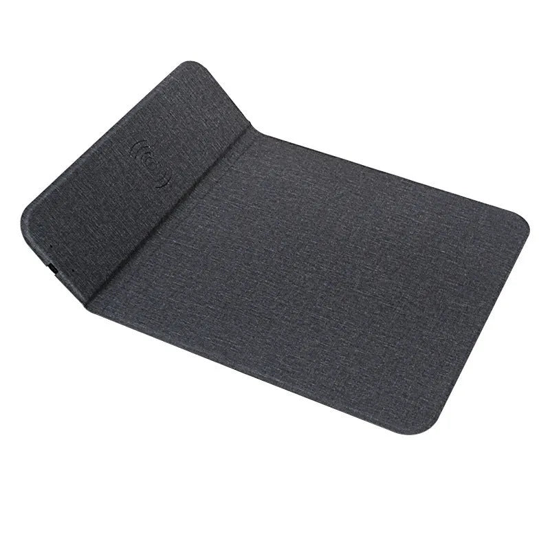 Black 2-in-1 wireless charging mouse pad with non-slip base and phone stand on a desk