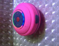 Mini waterproof LED Bluetooth speaker in blue, 85x85x45mm, with round ABS body and charging port