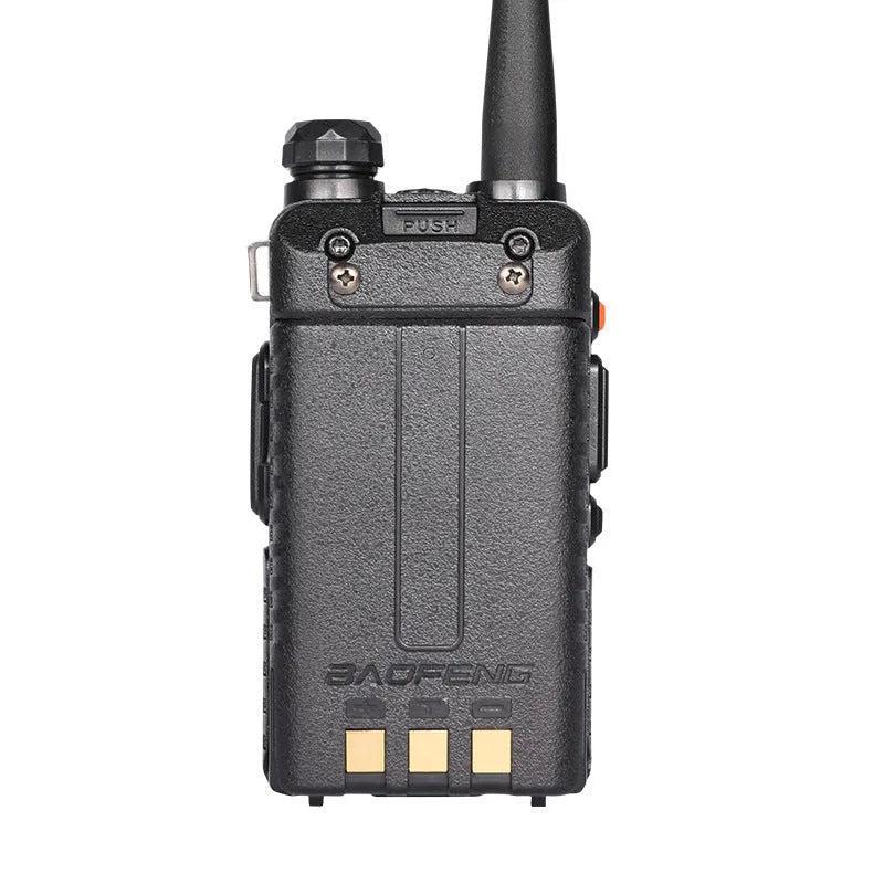 Compact black walkie talkie with LCD display, shown with its antenna extended.