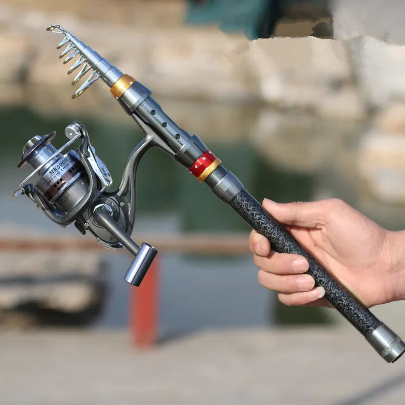 Carbon fibre telescopic sea fishing rod set with spinning reel combo in collapsed and extended positions