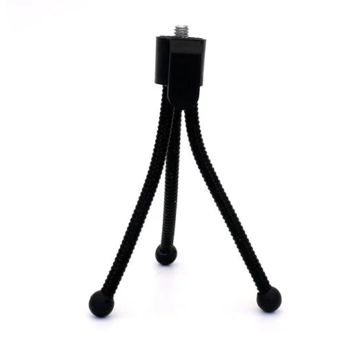 Small black iron mini tripod with telescopic legs and a universal ball head, shown holding an iPhone.