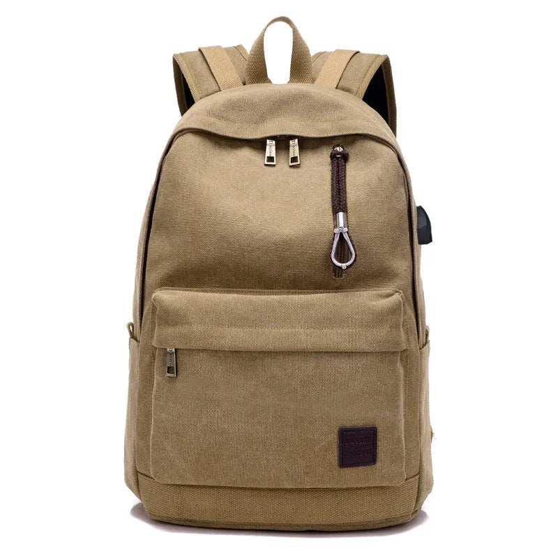 Coffee coloured canvas backpack with USB charging port and multiple zippered compartments
