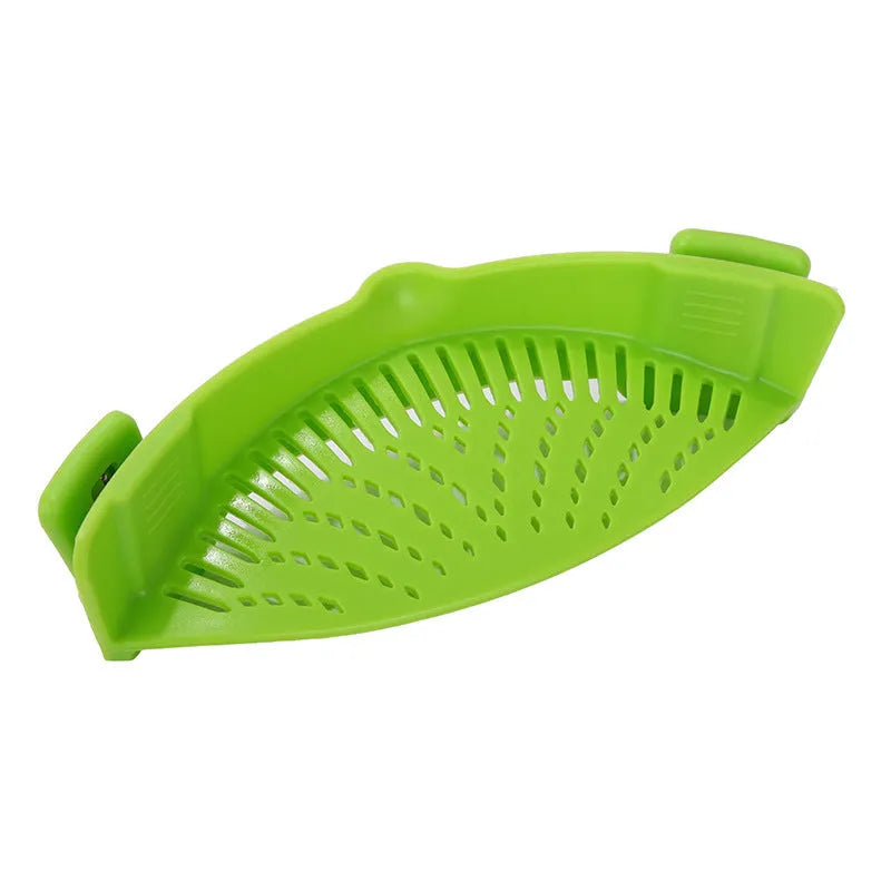 Silicone clip-on kitchen strainer with stainless steel filter mesh attached to a pot rim