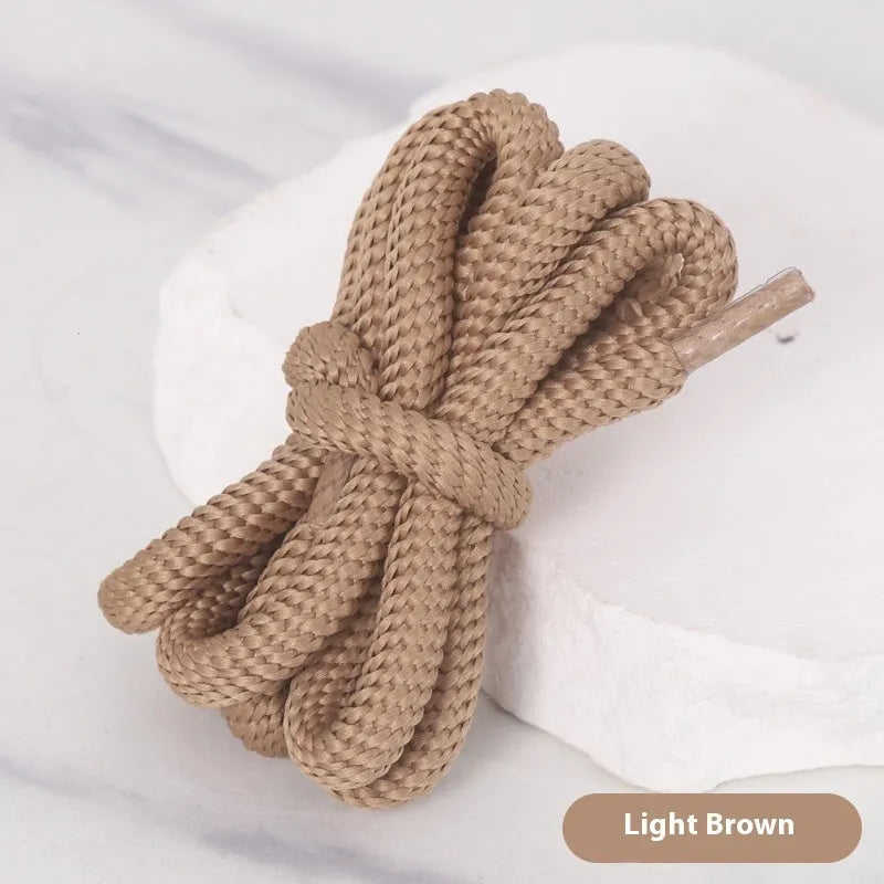 Flat oval woven shoelaces in various colours showing 1.0cm width and length options.