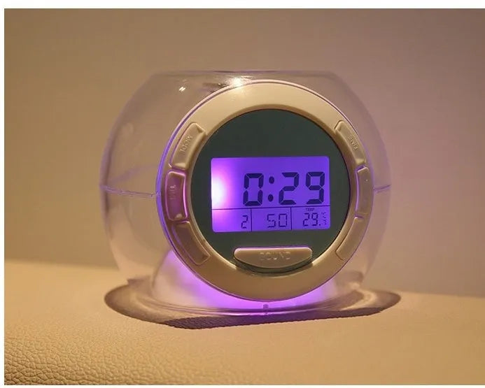 White colourful natural sound alarm clock with LCD display showing time and temperature