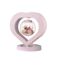 Pink preserved rose ornament with optional base and audio Bluetooth functionality for gift giving