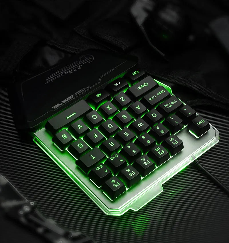 Black G40 Flow one-handed mechanical gaming keyboard with RGB backlit keys on a desk.