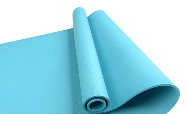 EVA yoga mat in one of six colours showing 4mm or 6mm thickness option on a floor