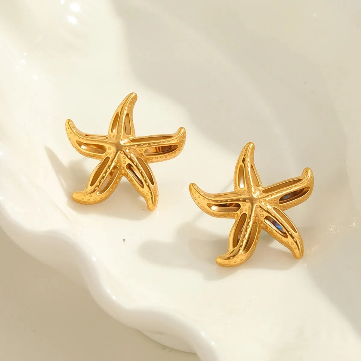 Design Sense simple stud earrings for women, starfish shape, 18K gold plated stainless steel, fashion OL style