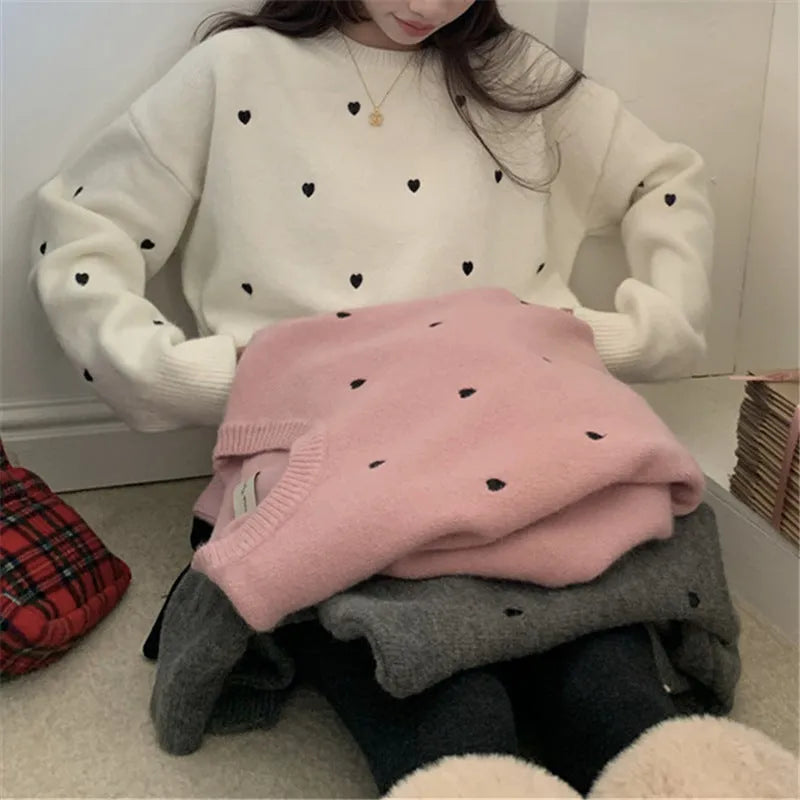 Women's loose fit acrylic pullover sweater with embroidery detail in milky white, grey, or pink.