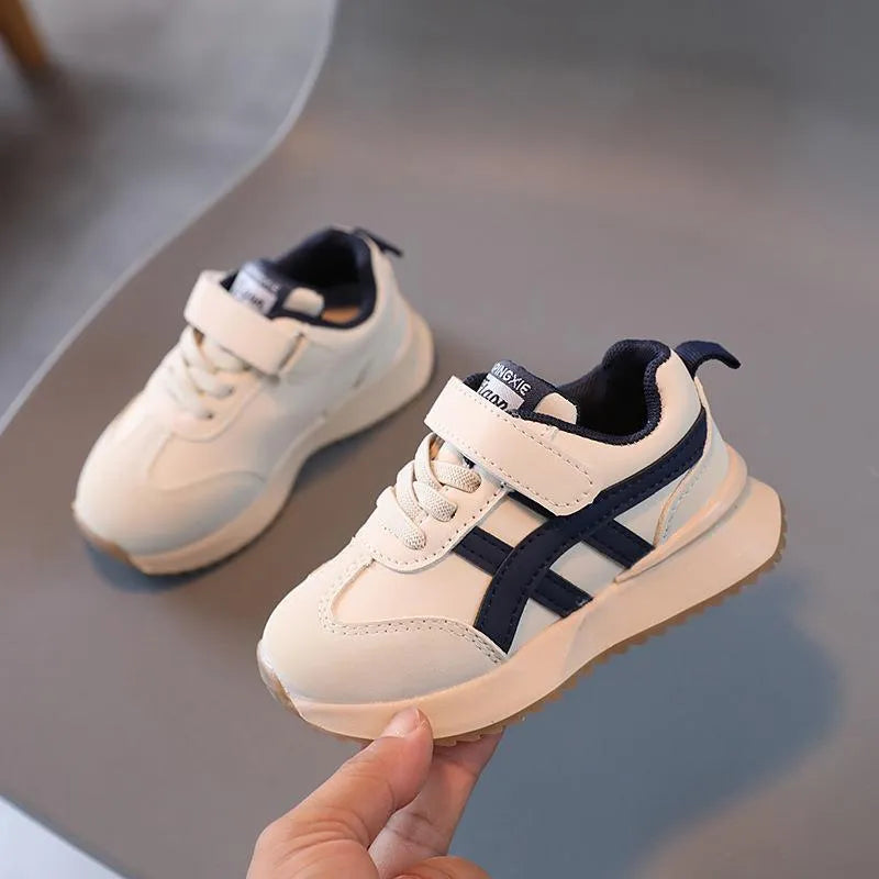 Children's white synthetic leather sneakers with Velcro fastening and rubber non-slip soles