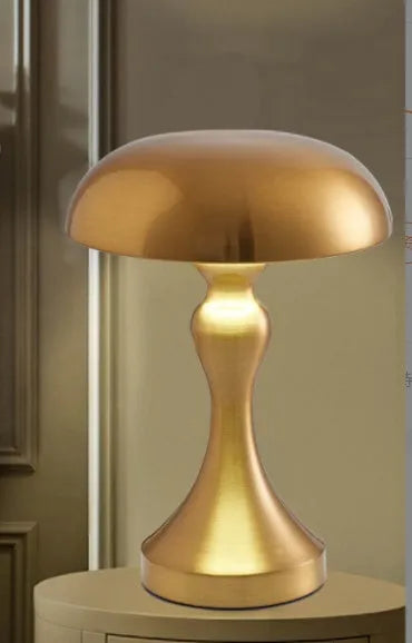 Metallic USB rechargeable LED desk lamp with touch control showing three colour light options.