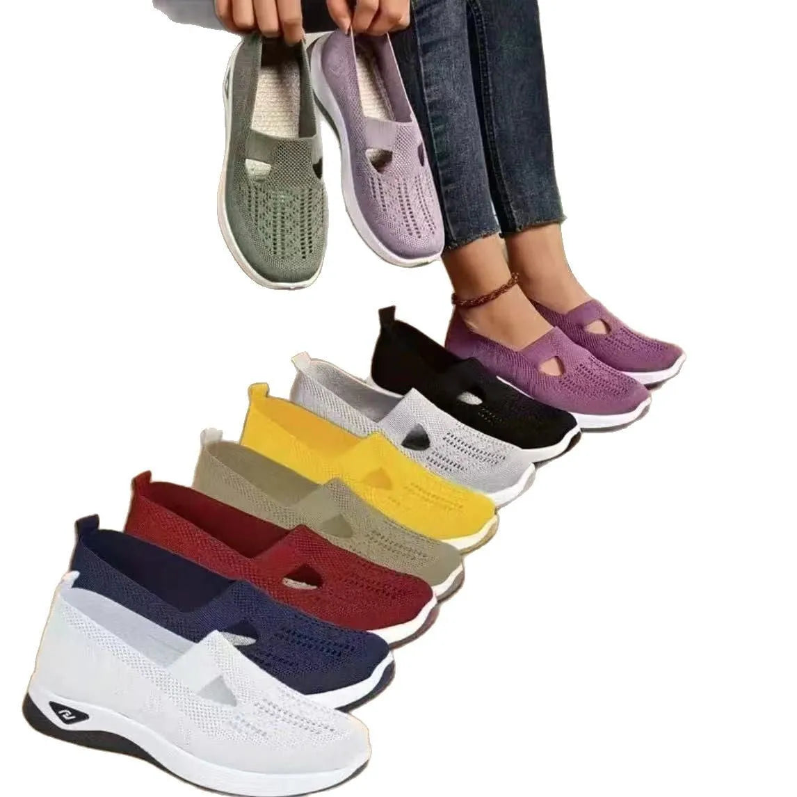 Women's low-top mesh casual flats with a T-strap in various colours on a soft PVC sole.