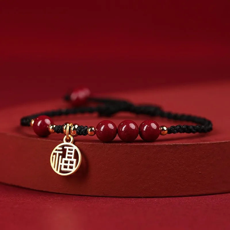 Cinnabar braided rope bracelet with round bead blessing card in wine red colour