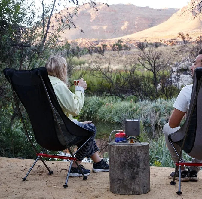 Portable ultralight camping chair in black with aluminium alloy frame folded