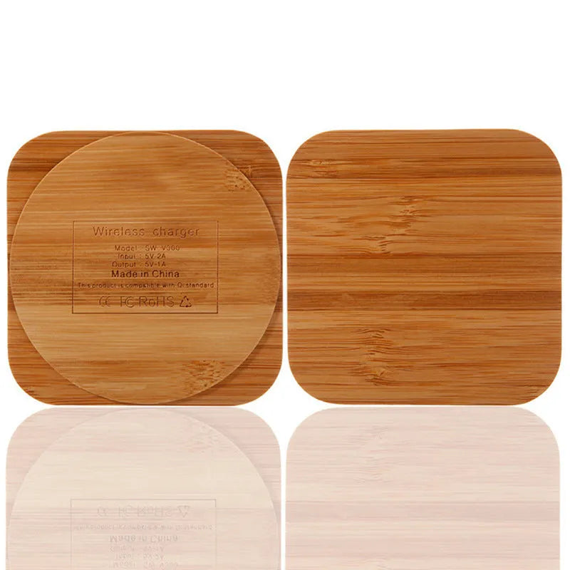 Square brown wooden bamboo 5W wireless charging pad for smartphones on a table.