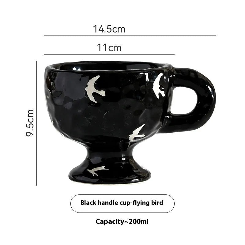 Hand-pinched irregular ceramic mug in solid colour with modern design and 14.5cm height