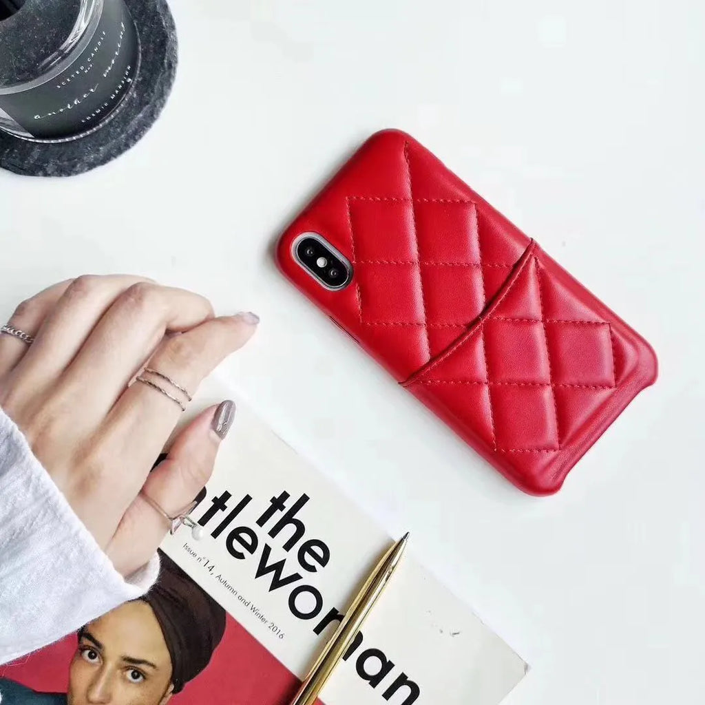 Leather mobile phone case for iPhone, shown in black, pink, and red colour options.