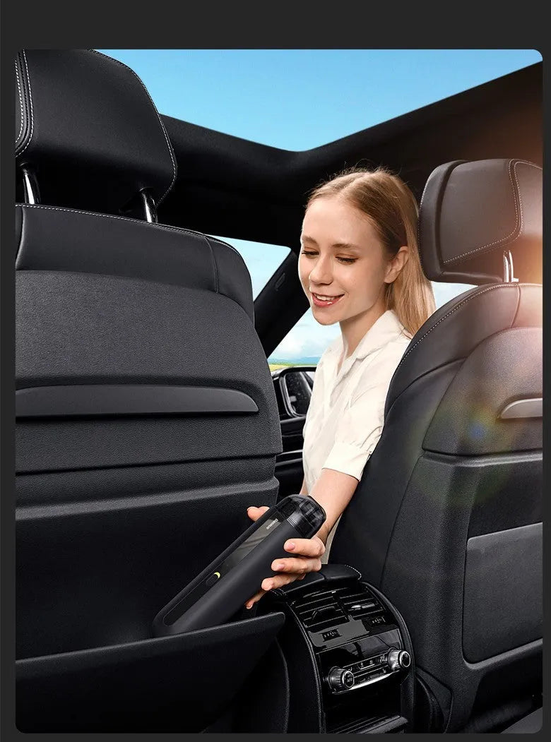 Compact handheld wireless car vacuum cleaner in black, white, or green, showing suction nozzle and blowing hose.
