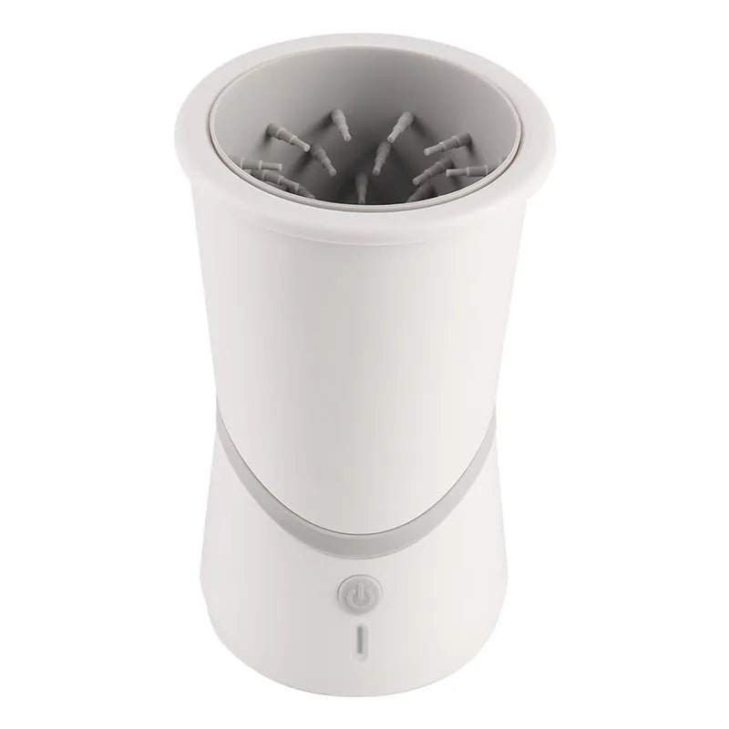 White pet electric foot washer with ABS plastic cylindrical body standing on paws