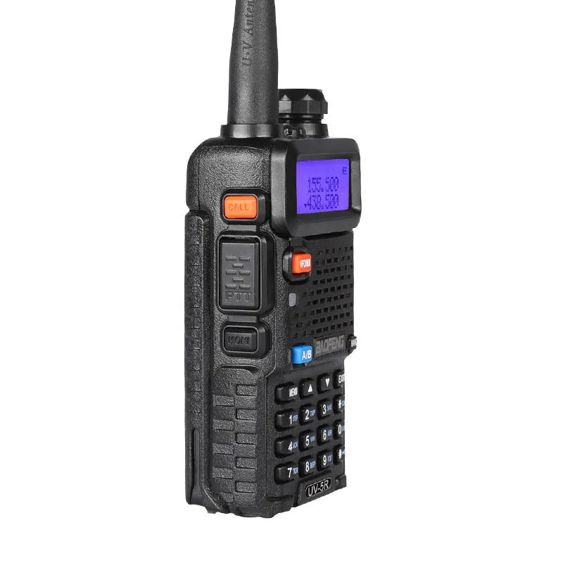Compact black walkie talkie with LCD display, shown with its antenna extended.