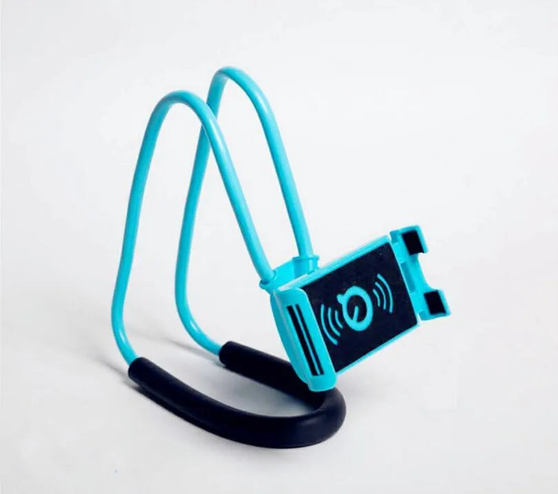 White plastic and foam 360-degree rotatable universal phone holder on a table.