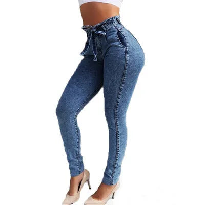 Fringed jeans in cowboy fabric showing fringe detailing, available in dark blue, grey, and light blue colours