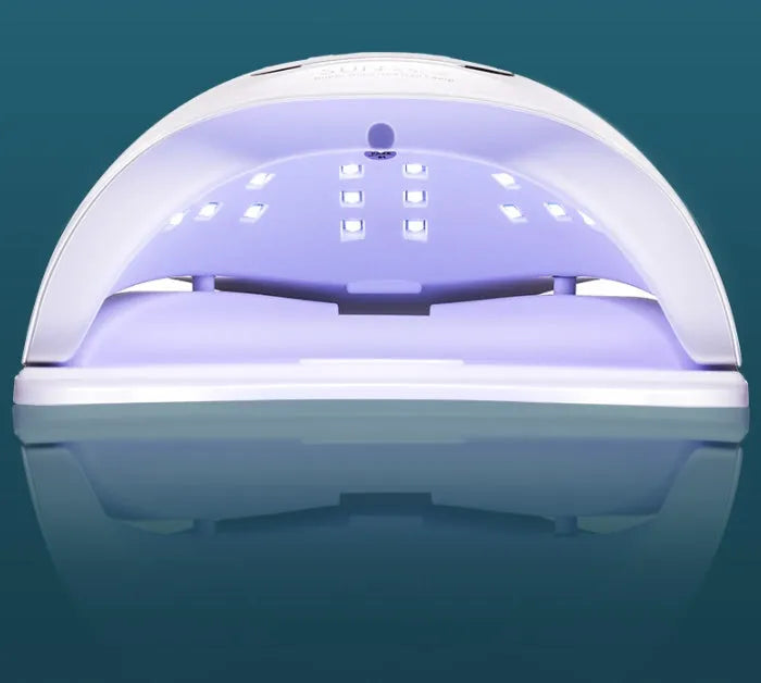 White nail polish drying lamp with dual UV LED light source and multiple timing buttons