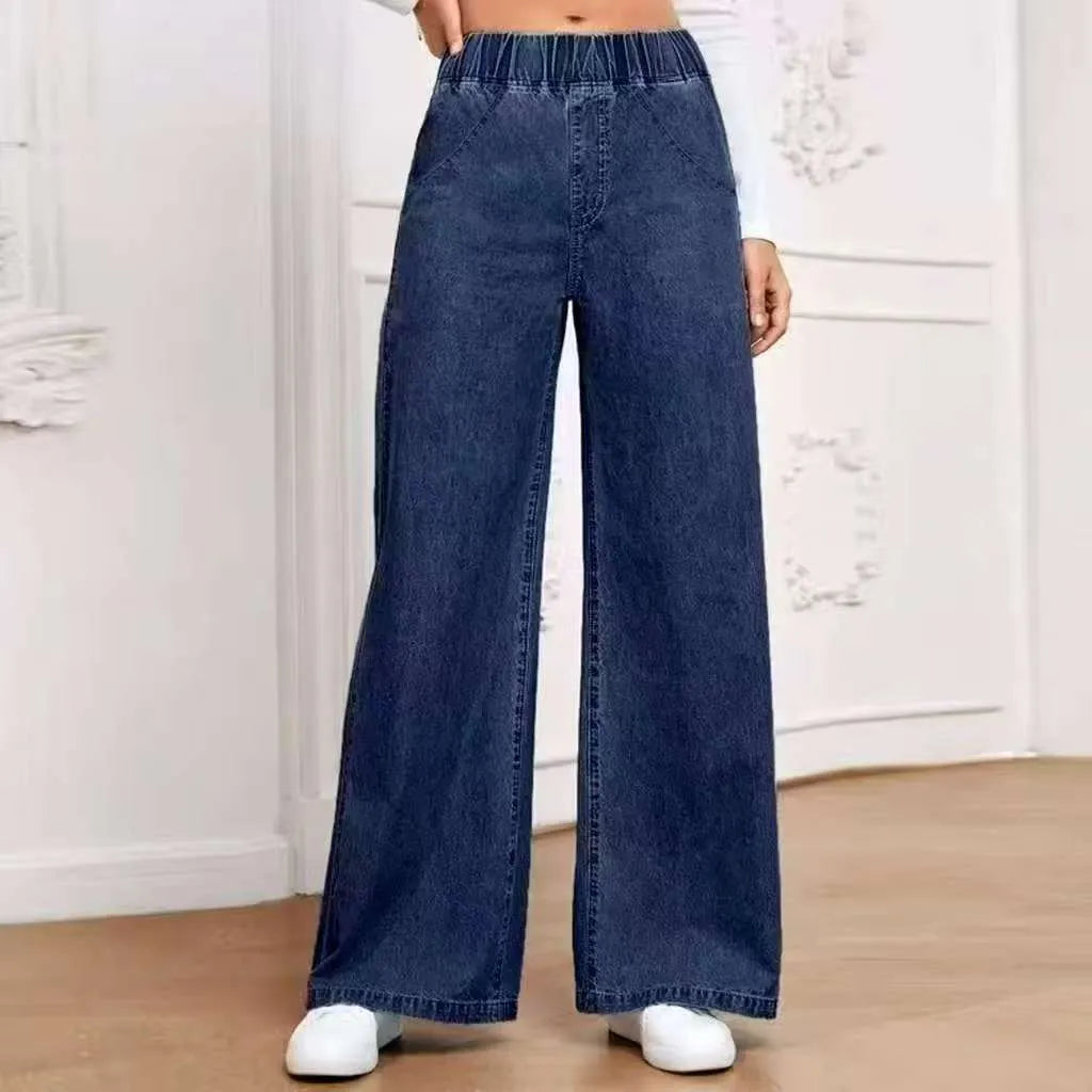 Plus size light blue washed straight-leg jeans with wide leg and mid waist