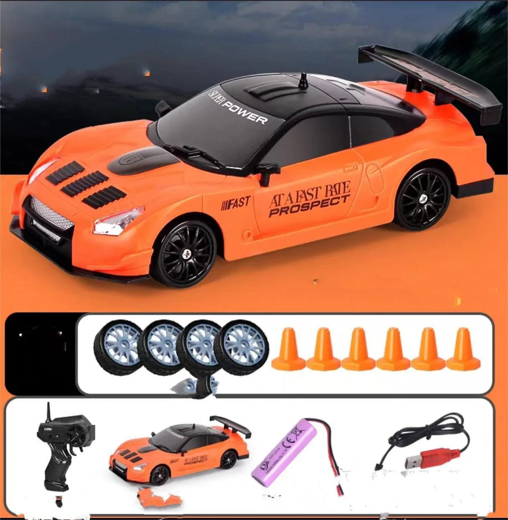 1:24 scale RC drift car with 4WD, 2.4GHz remote, GTR AE86 body, 4 racing tyres and 6 traffic cones