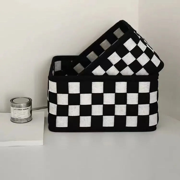 Checkerboard woven felt storage basket showing folding design and 37x29x19.5cm dimensions