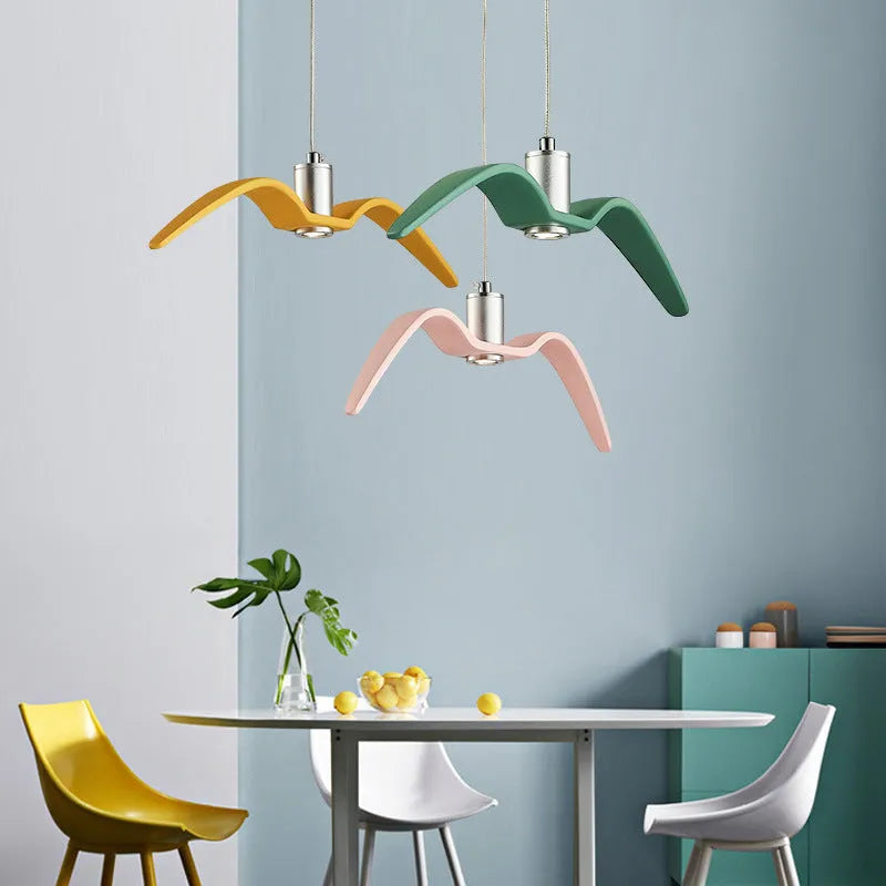 Nordic modern macaron-shaped LED chandelier light fitting in multiple colour options.