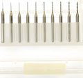 Close-up of a set of imported tungsten carbide micro-engraving bits in various sizes from 0.10mm to 2.00mm diameter.