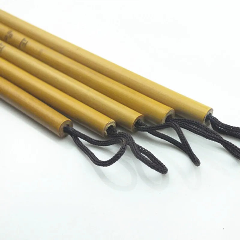 Red Chinese calligraphy brush with sheep hair and wolf tail blend on white background