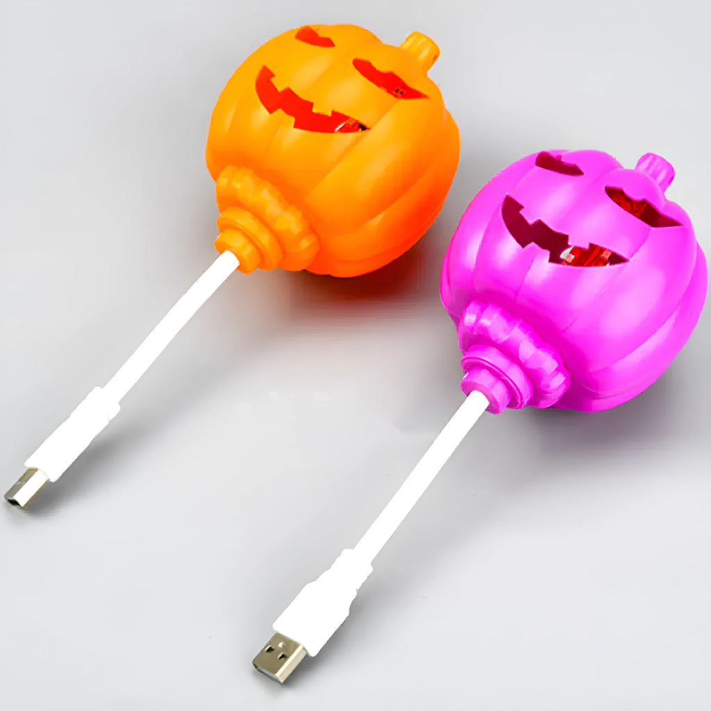 Plastic pumpkin lamp with USB cable, showing yellow and purple light options, scale shown against 8.3x22cm dimensions