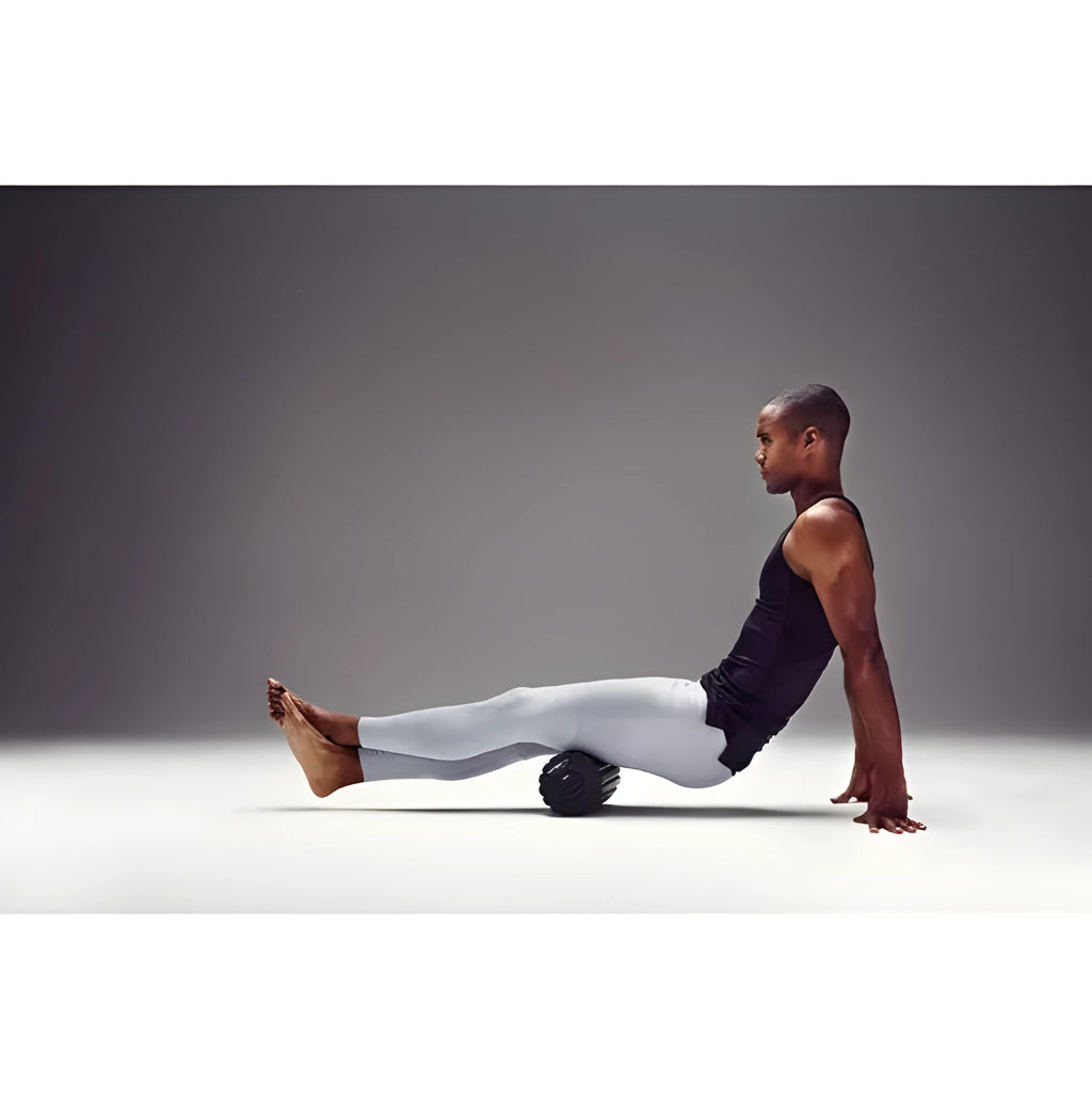 Black 4 speed vibrating foam massage roller, 800g, for post-exercise muscle massage