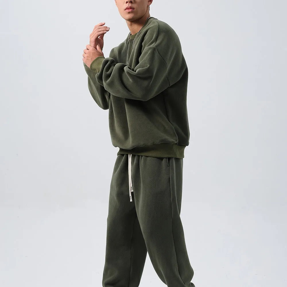 Men's polar fleece suit set showing crew neck jacket and padded trousers in five winter colour options