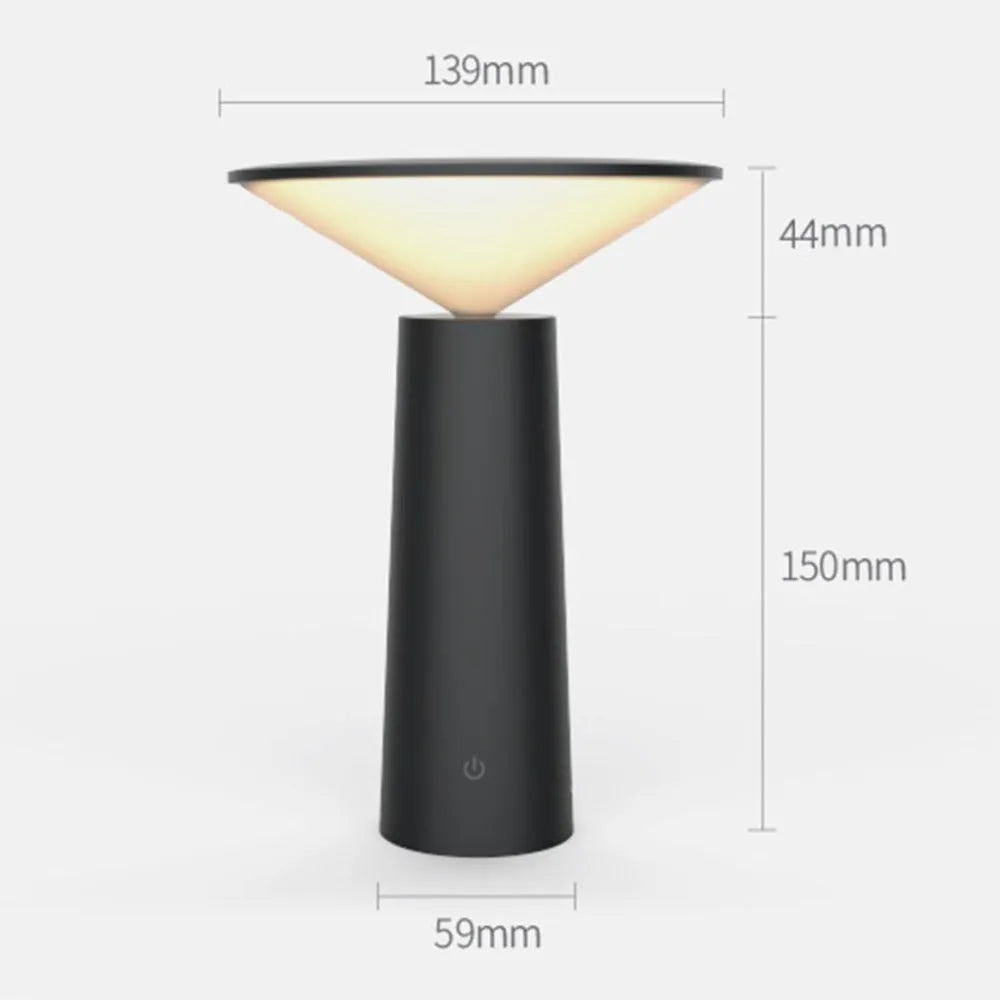 Black USB rechargeable table lamp with adjustable LED reading light head on a desk.