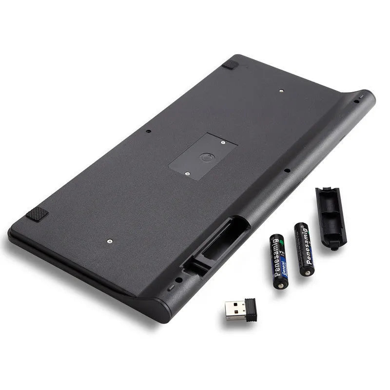Black wireless keyboard and mouse set with 4G connectivity on desk