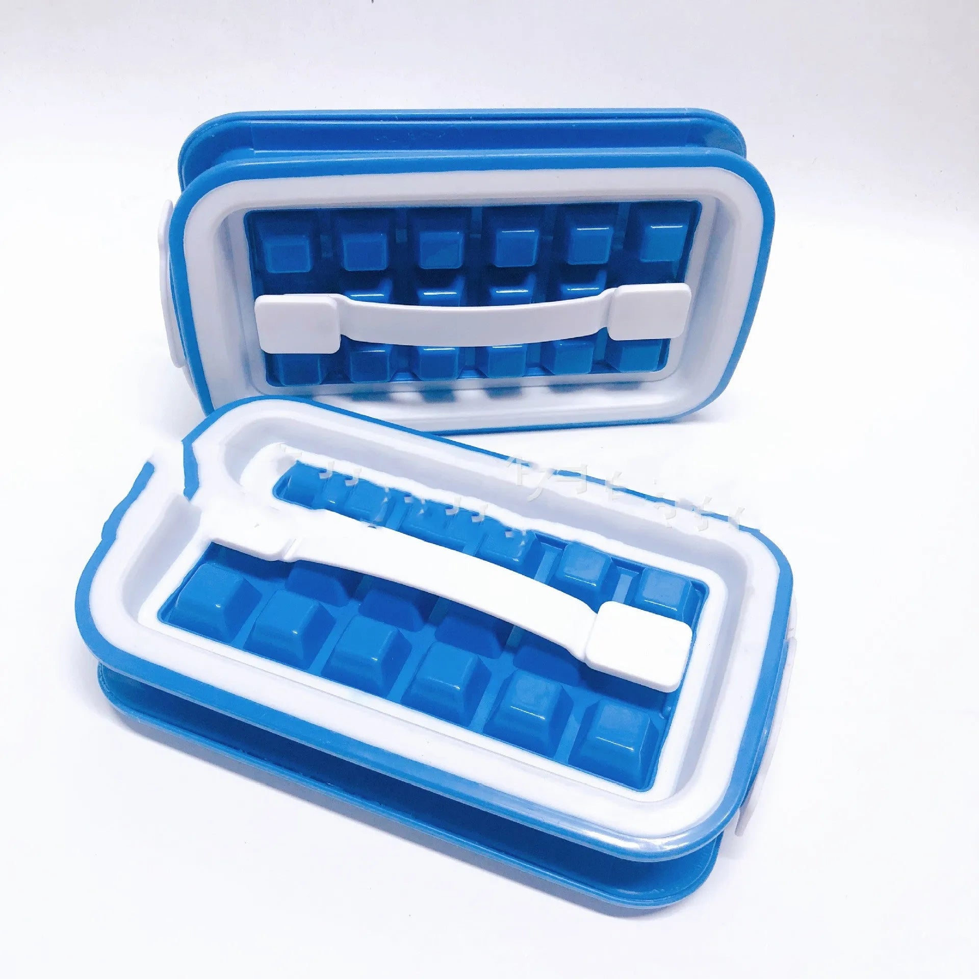 Blue silicone ice cube tray with 36 grids on a white background showing lid and one removed cube