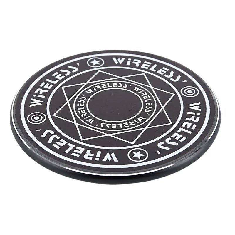 Magic array wireless charger in black with light indicator on desk showing 10W fast charge