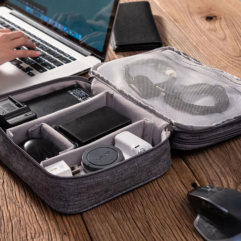 Grey waterproof double-layer travel cable organizer bag with portable handle and multiple pockets