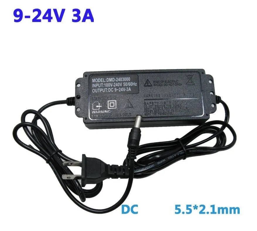 Compact black adjustable power adapter with LED digital display showing voltage output on a white background