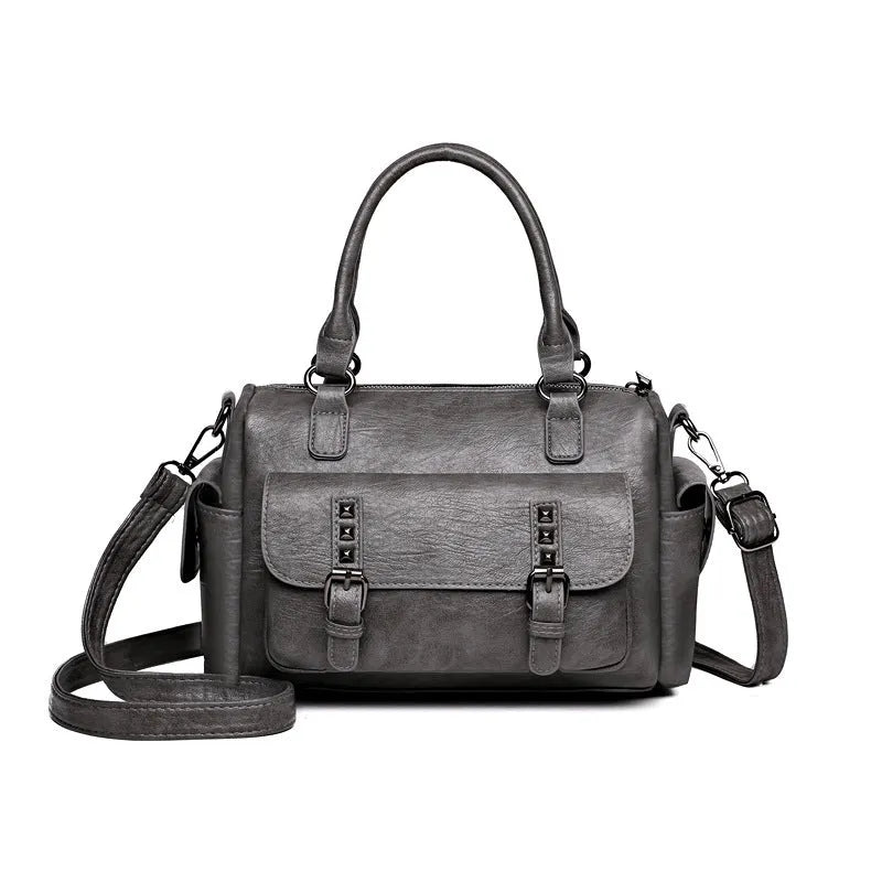 Large capacity vintage messenger bag in horizontal square shape, shown in available colours: blue, gray, camel, red, black, brown.